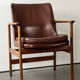Leather and wood armchair by Ib Kofod Larsen