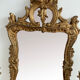 Antique mirror in stuccoed and gilded wood - rocaille style - France 50x86cm