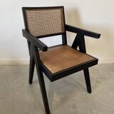 Black wooden armchair with caning