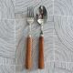 Paire de couverts en inox et olivier