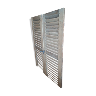 Pair of old unwrapped shutters