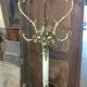 Coat holder on onyx and gold metal foot