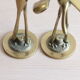 Couple of herons, golden brass