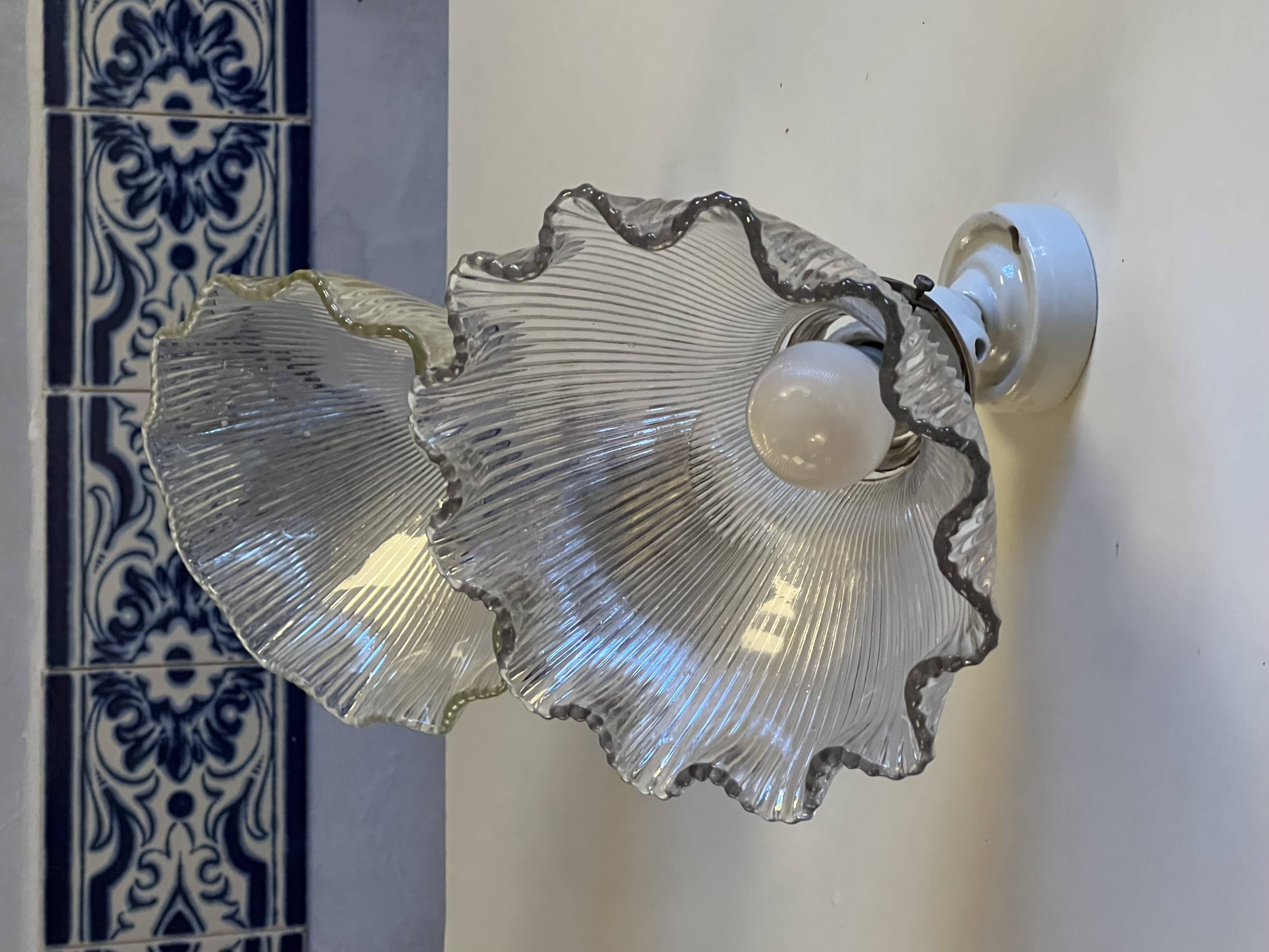 Holophane wall lights with bistro-style porcelain supports