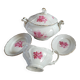 Soup tureen, gravy boat and serving dishes