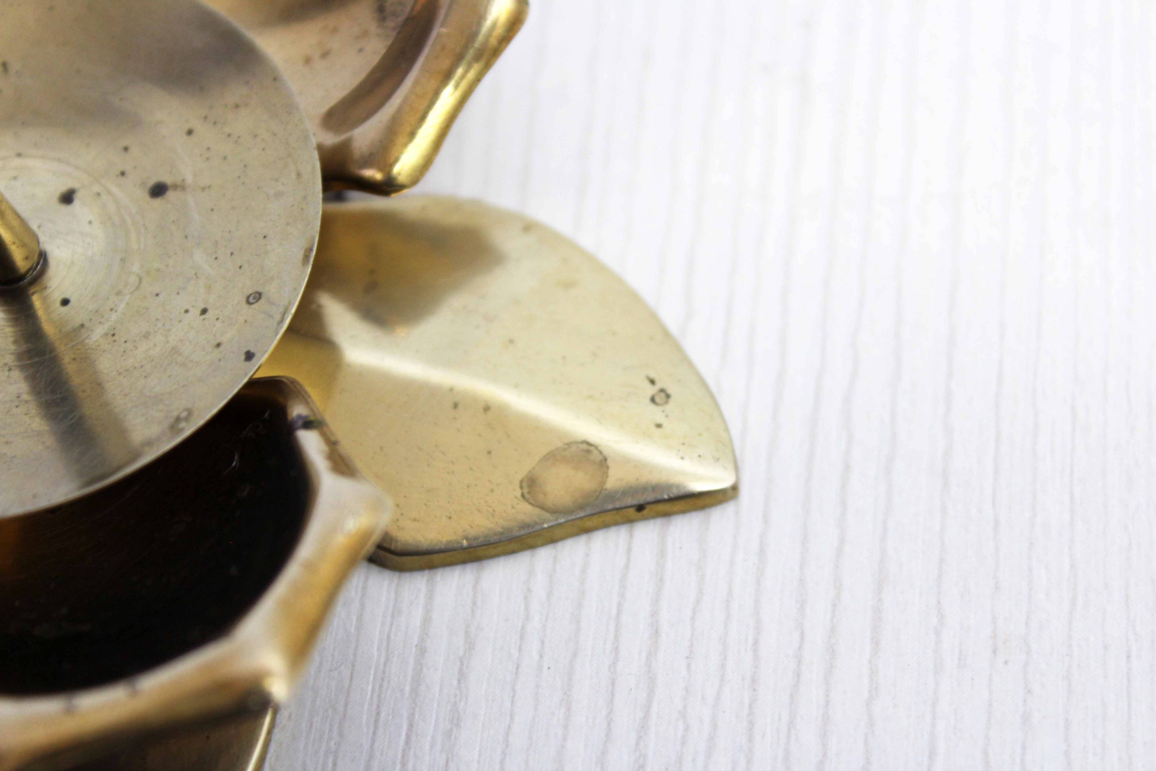 Brass flower candle holder