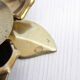 Brass flower candle holder