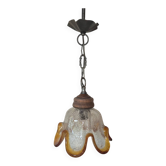 Vintage suspension with textured glass and amber-edged wood.