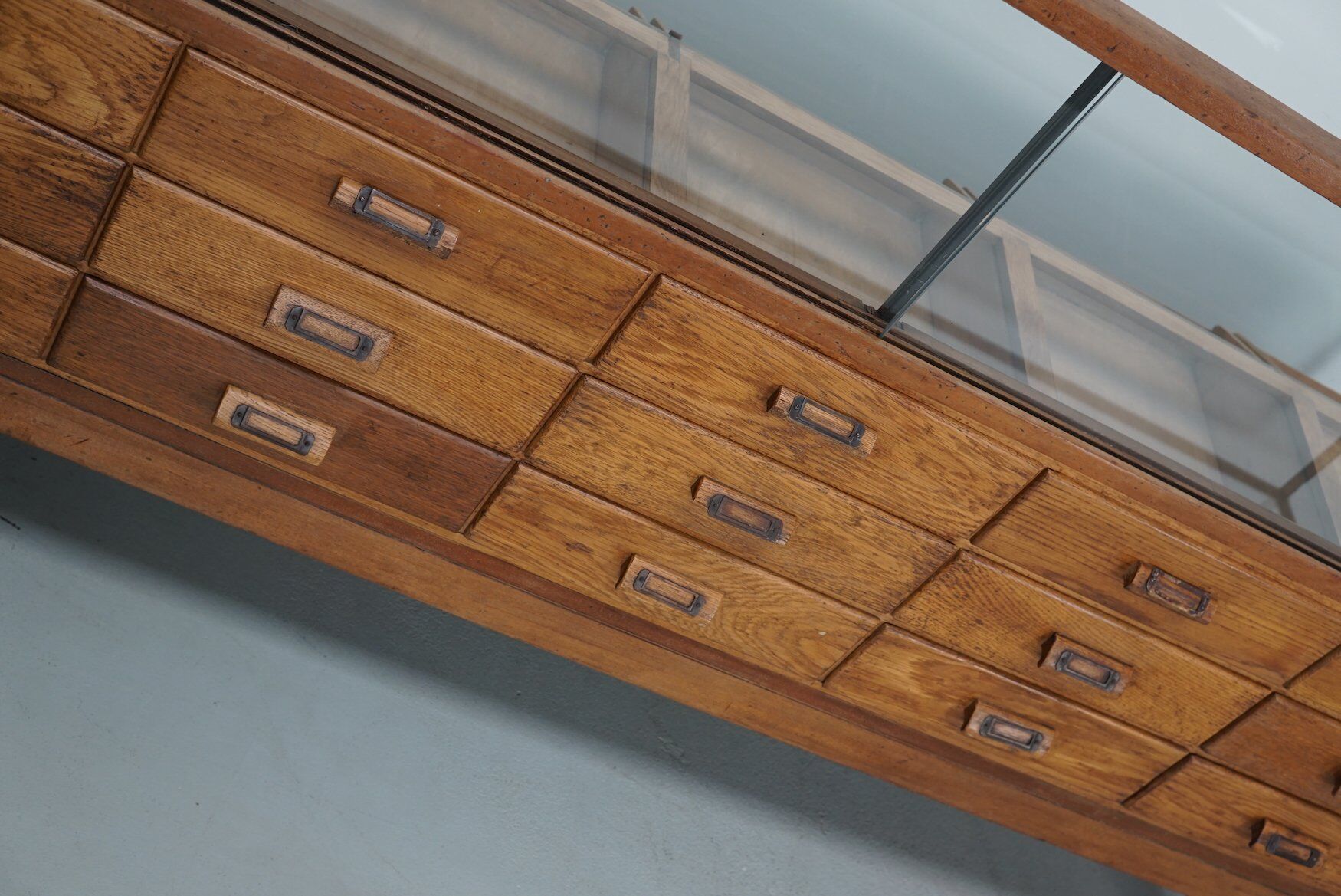 Antique British oak haberdashery cabinet, 1930s