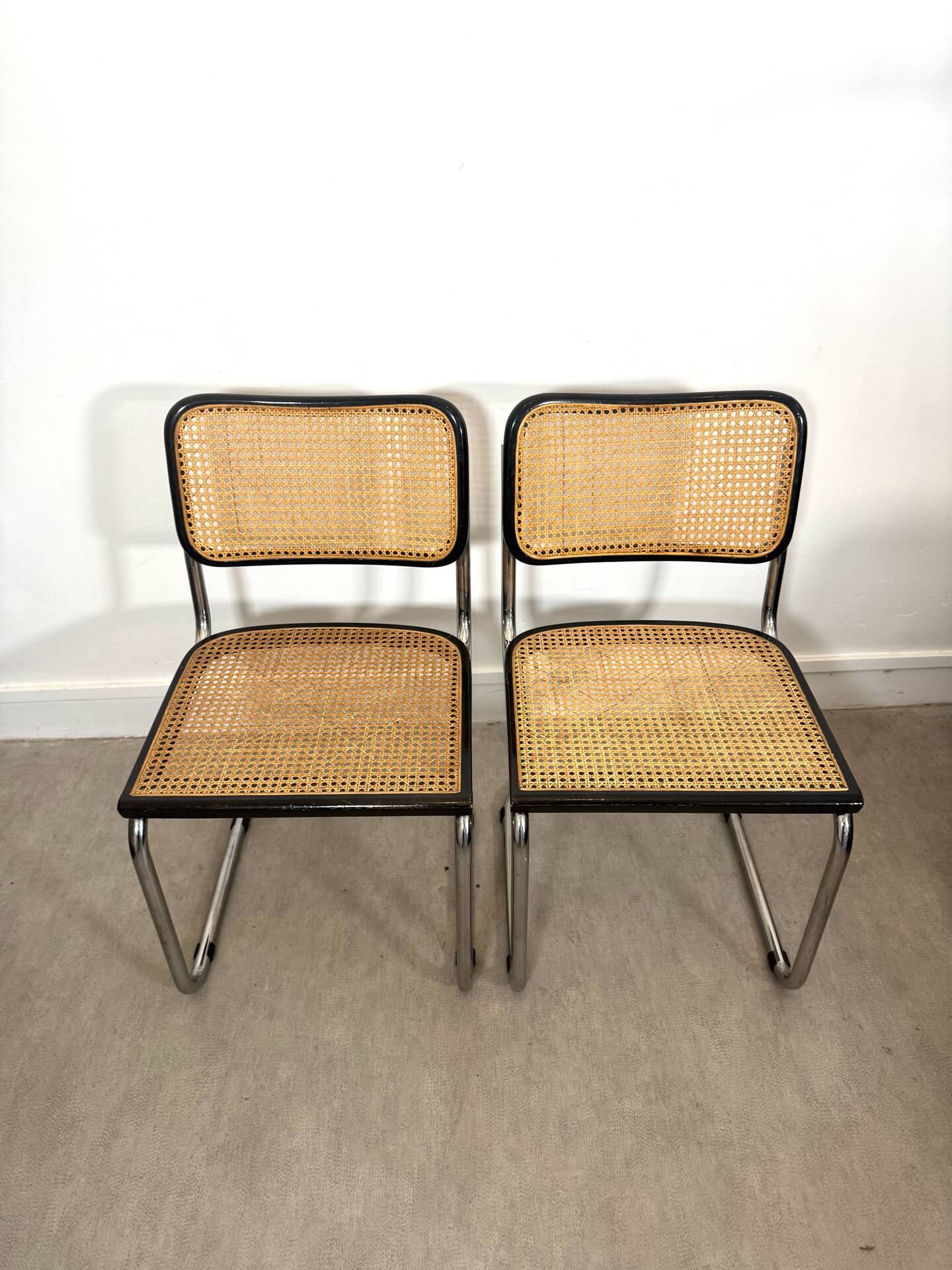Pair of Marcel Breuer B32 Cesca chairs made in Italy.