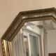 Octagonal mirror with gilded wooden beaded borders