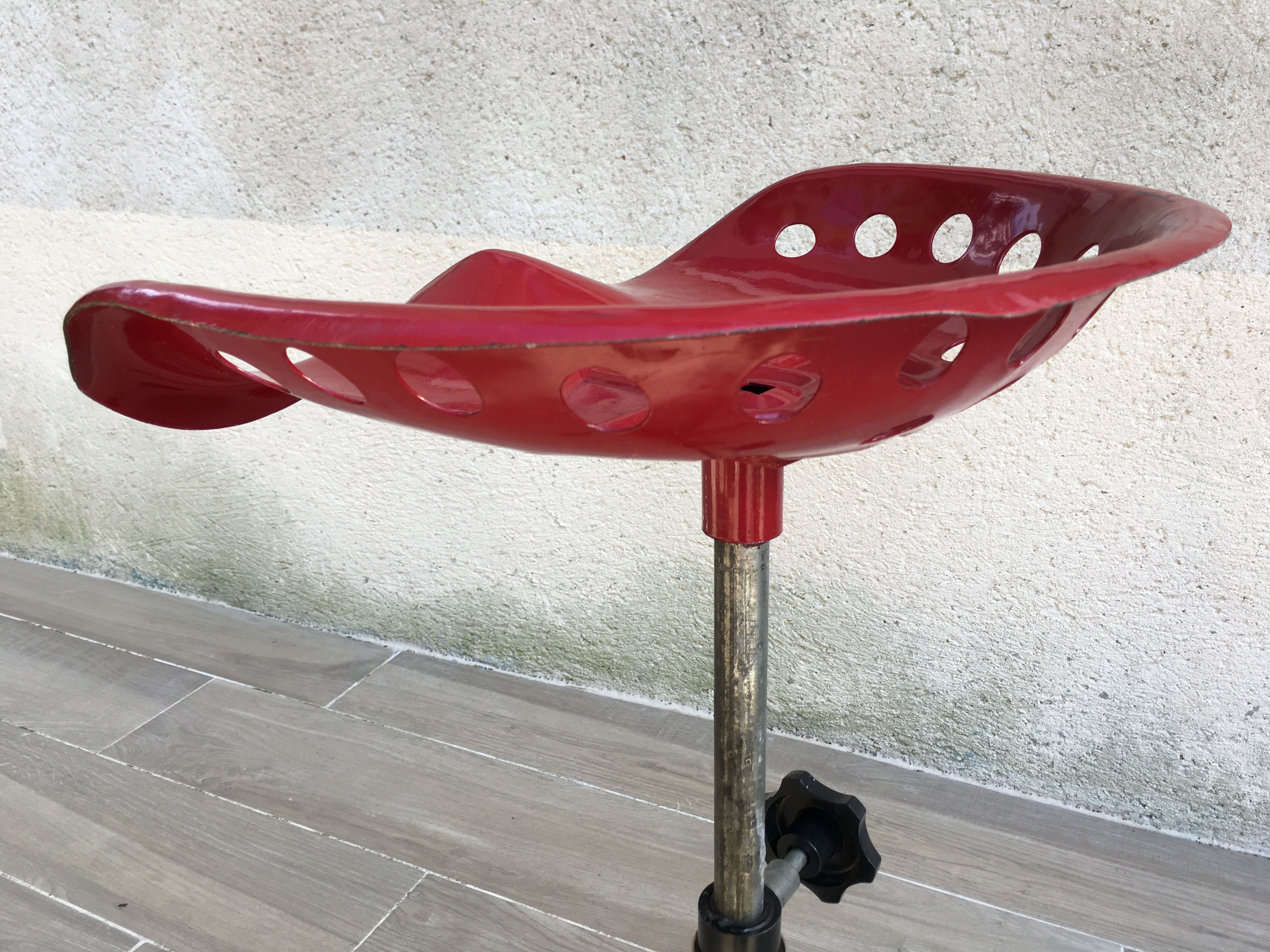 Vintage high stool sitting tractor