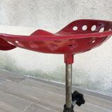 Vintage high stool sitting tractor