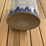 Asian teapot in basket