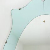 Two-tone glass and gilded brass console mirror. Circa 1950.