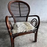 Mid-century Manou dark brown bamboo armchair with open rattan backrest, 1960s French