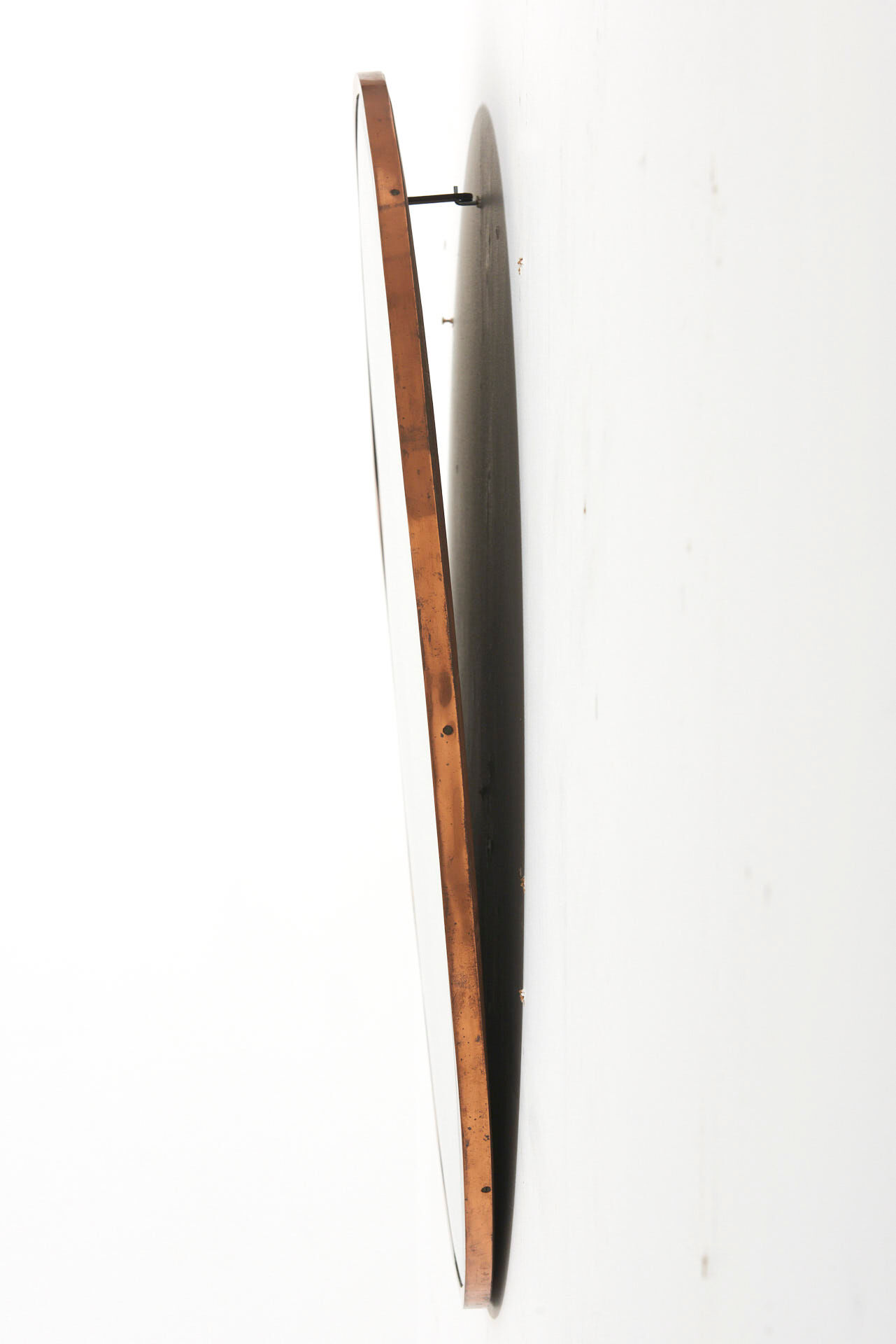 Round mirror in cupper 1960