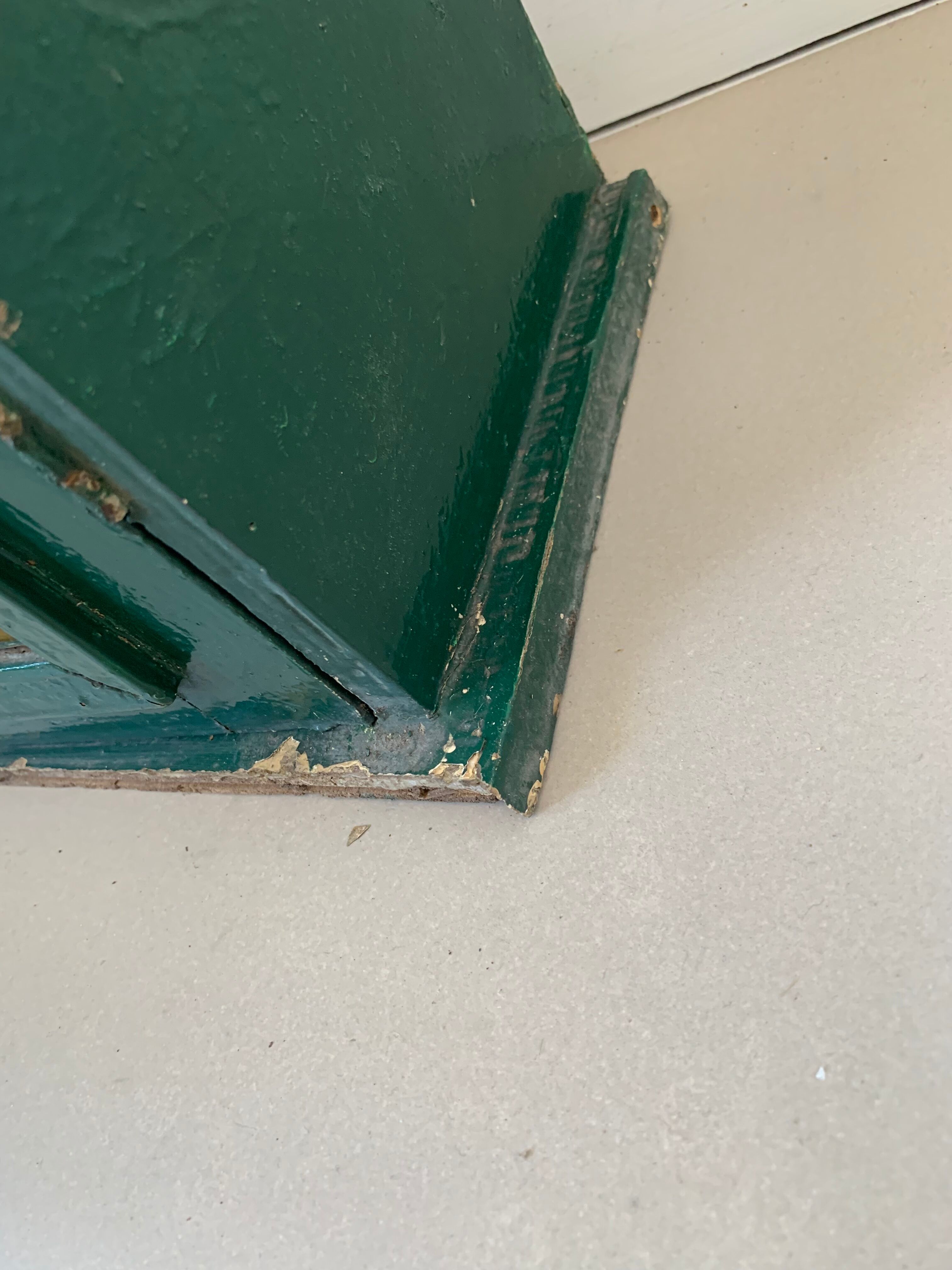 Wall vitrin with pediment