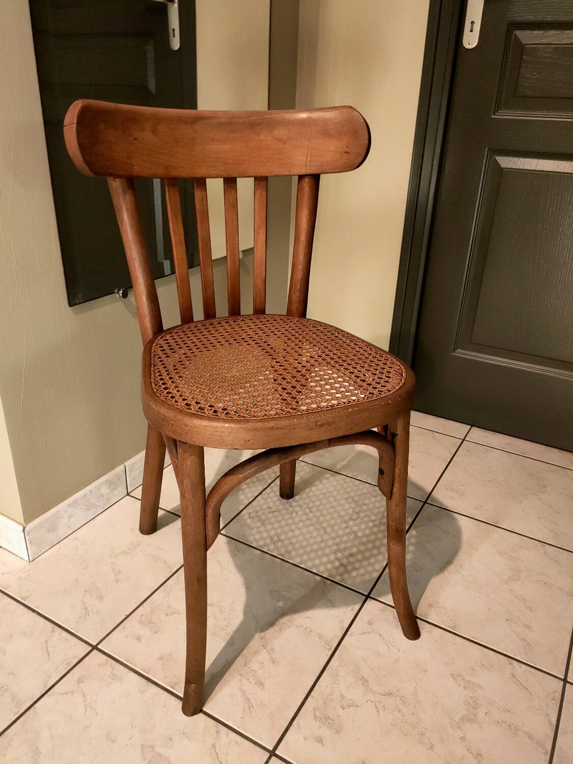 Old bistro chair with caned seat