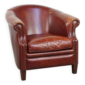 Fauteuil club en cuir de vachette couleur cognac de style anglais
