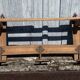 Wall-mounted coat rack in solid wood with shelf