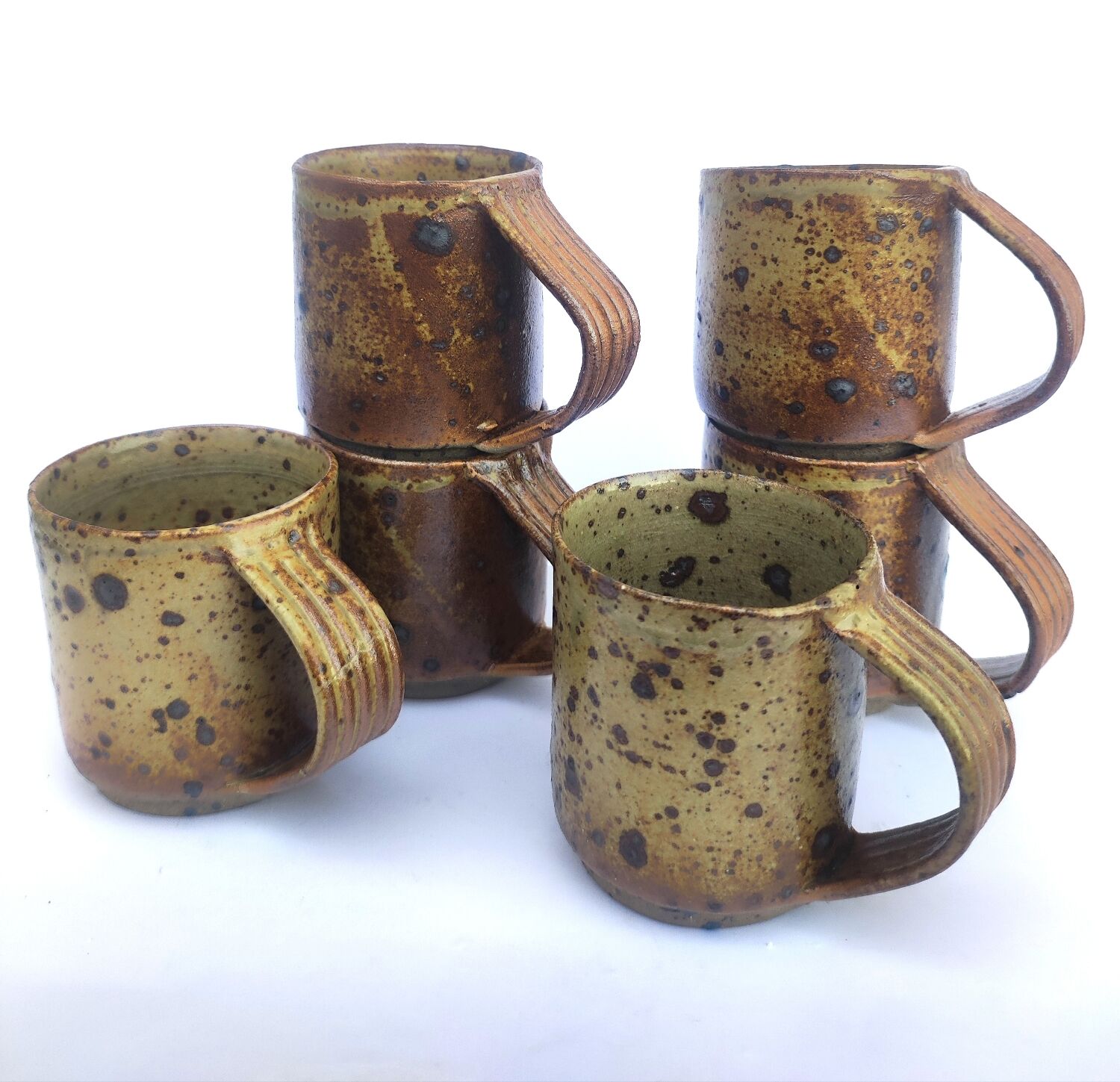 Cups + sandstone saucer by Puisaye Gaudry