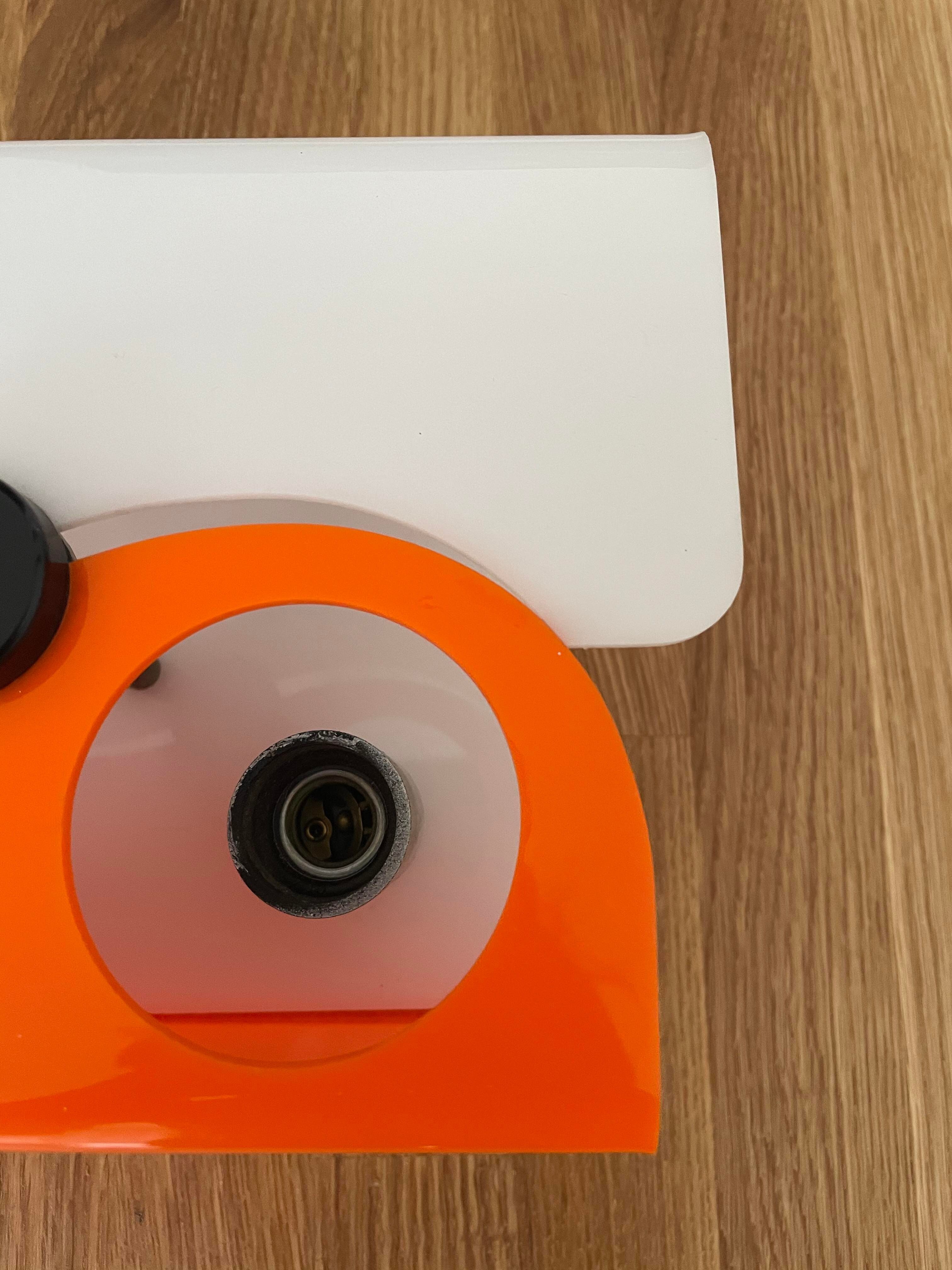 Vintage two-light wall lamp, ABS orange and white, France 1970