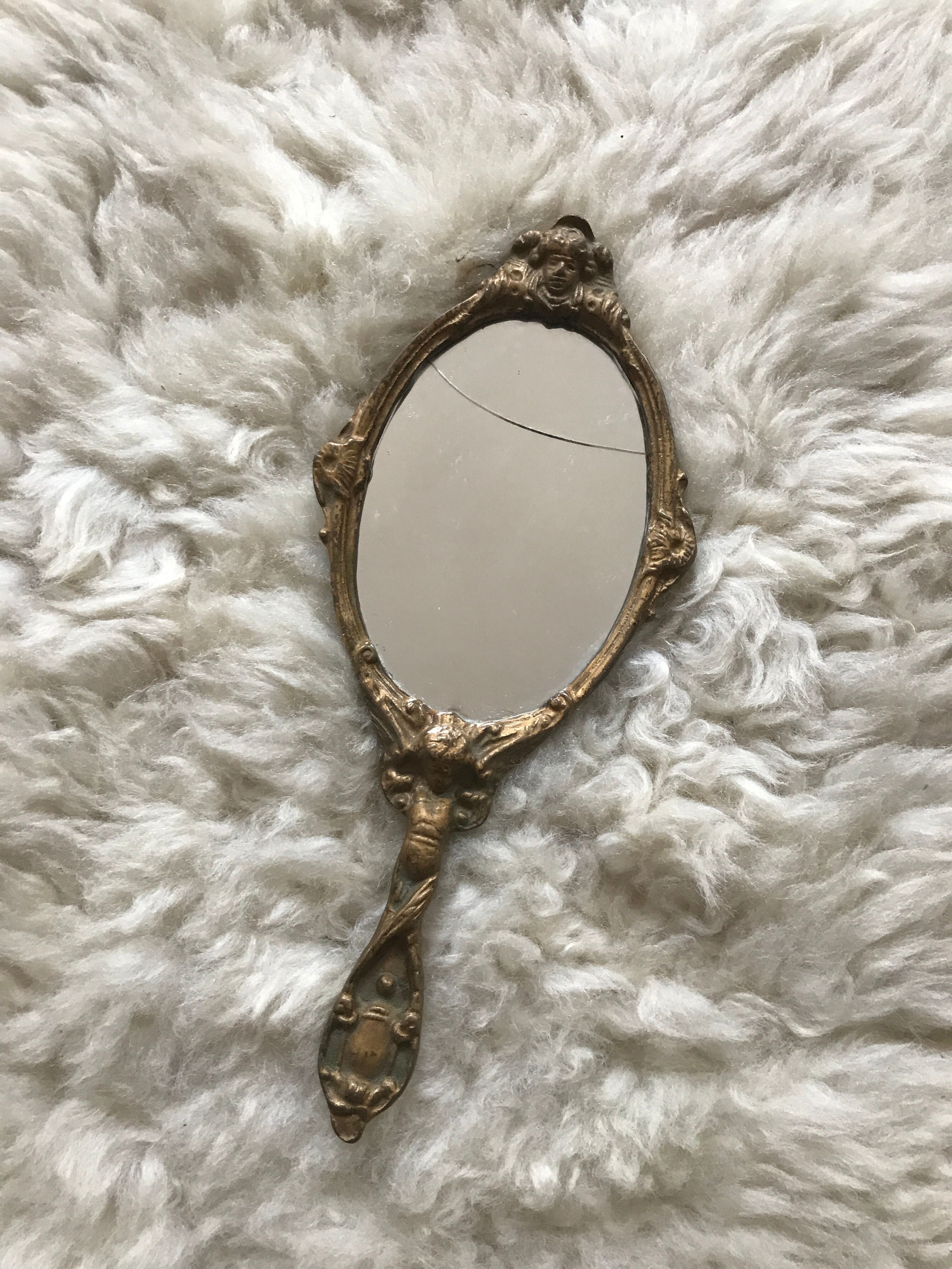 Face à main miroir ancien bronze 12x29cm