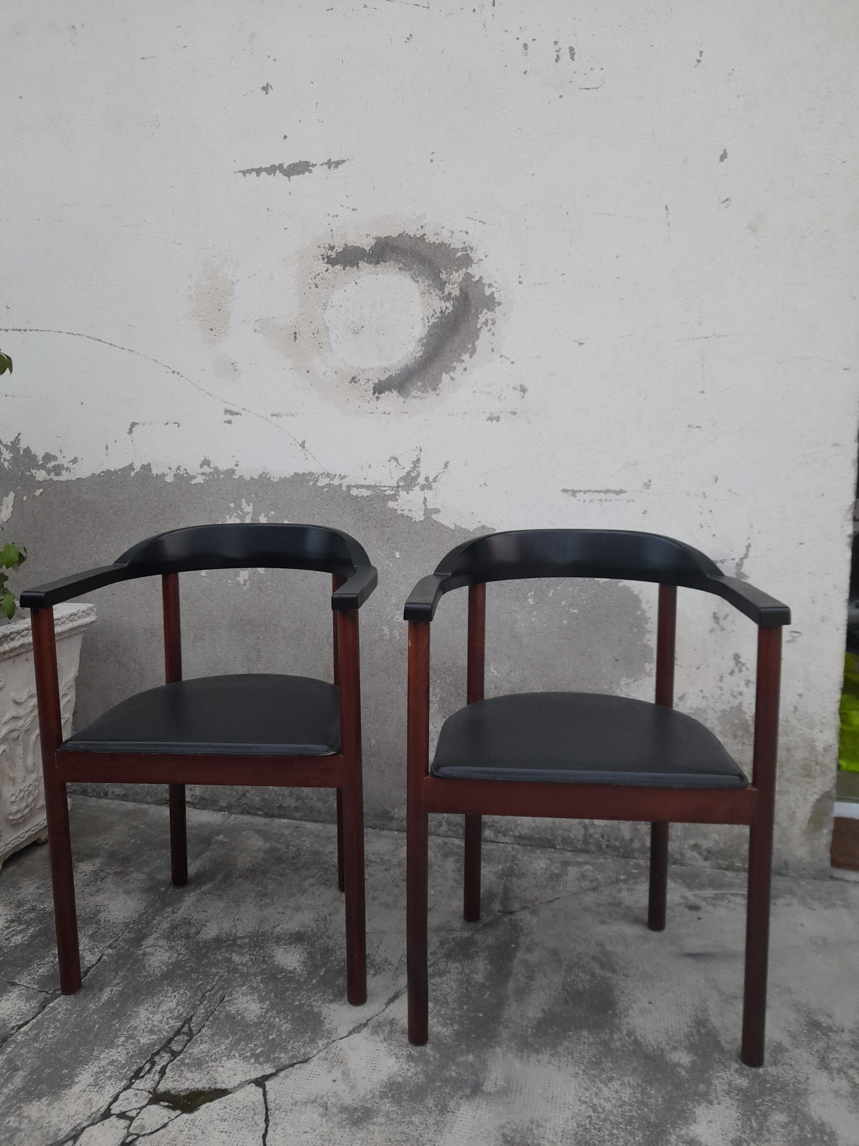 Pair of Scandinavian armchairs in teak and leather