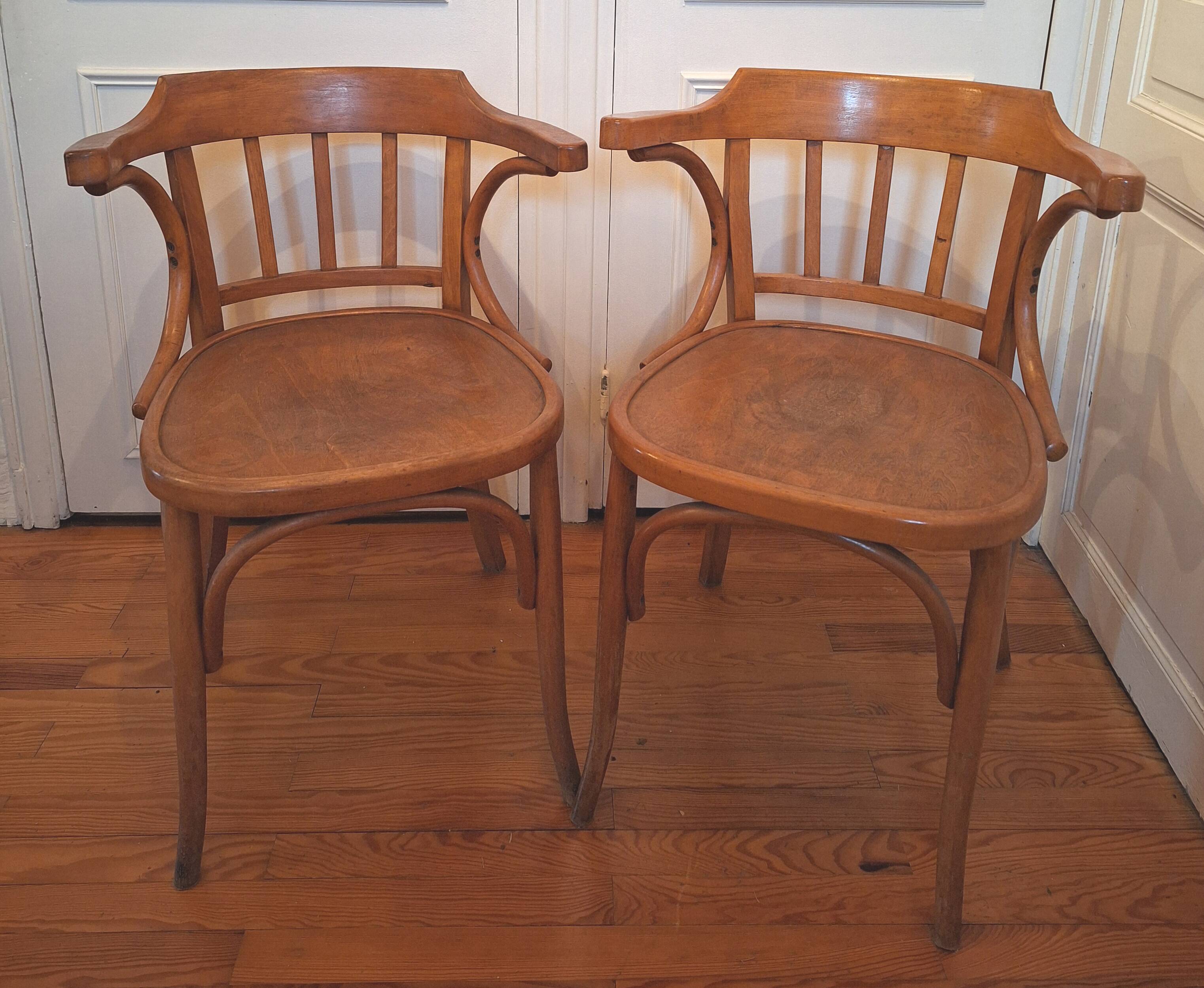 Curved wooden armchair