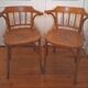 Curved wooden armchair