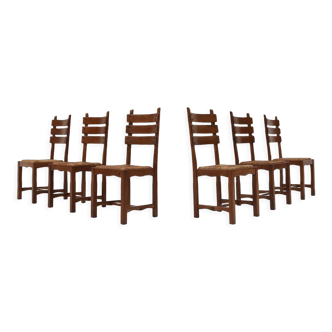 Set of six brutalist dining chairs in oak an wicker