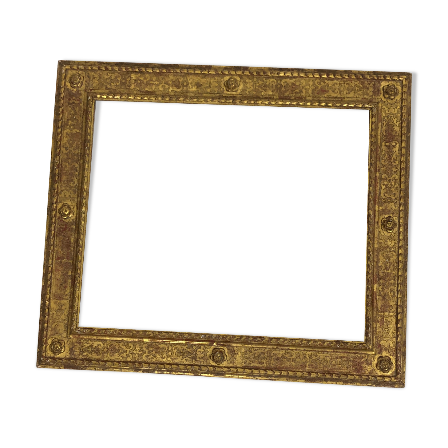 Vintage gilded frame decorated with stylized flowers