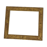 Vintage gilded frame decorated with stylized flowers
