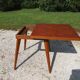 Extendable table with compass legs
