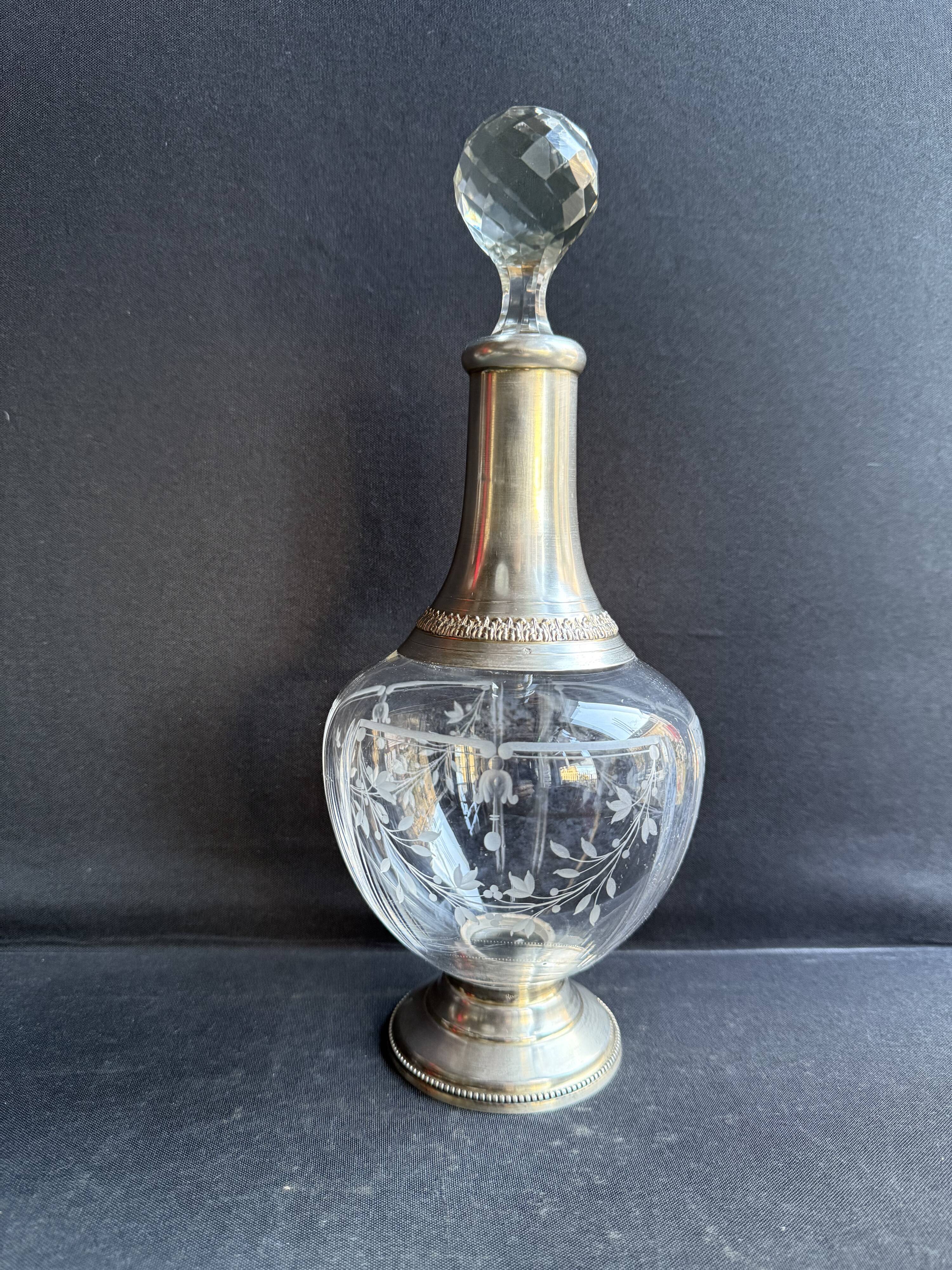 Cut crystal carafe with silver frame
