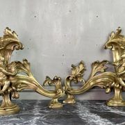 Paire de chenêts en bronze ciselé et doré d'après un modèle de Jacques Caffieri, Paris XIXème
