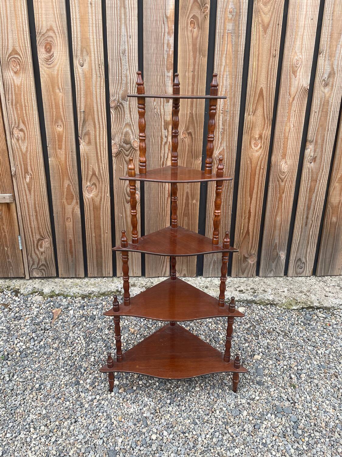 Wooden corner shelf on legs with 5 shelves