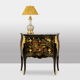 Commode sauteuse de style Louis XV en laque. Années 1950.