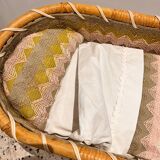 Vintage rattan doll basket