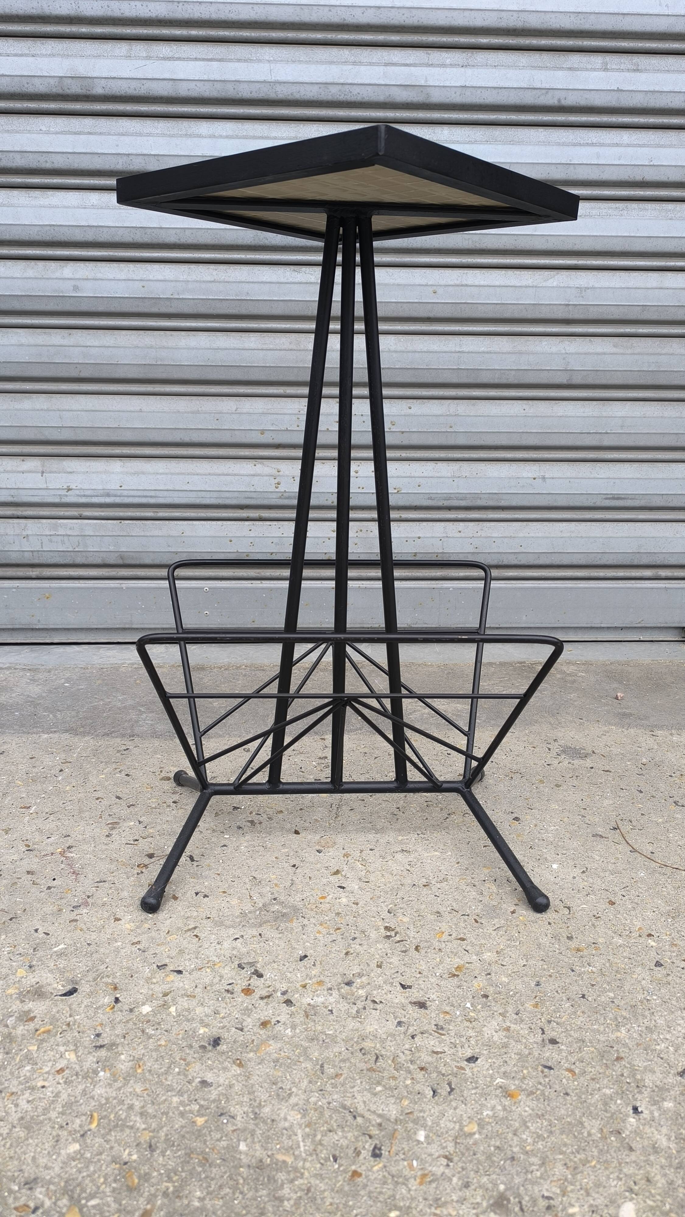 Iron and earthenware magazine rack, 1970