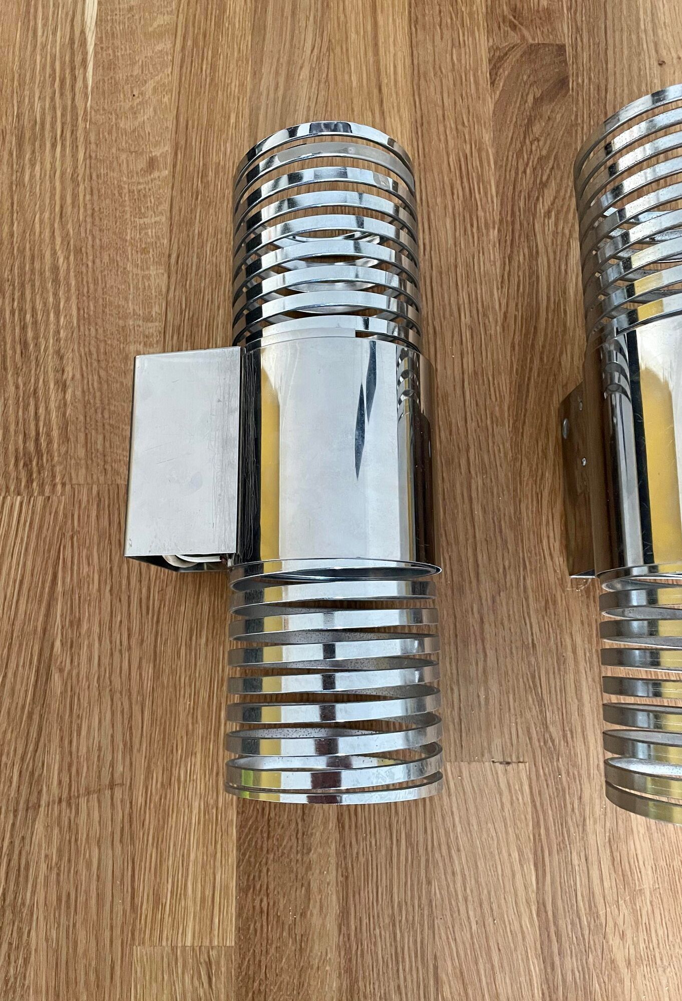 Pair of vintage wall lamps "Spring", chromed metal, France 1970