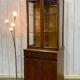 English display cabinet with two sections made of yew from the 1980s.