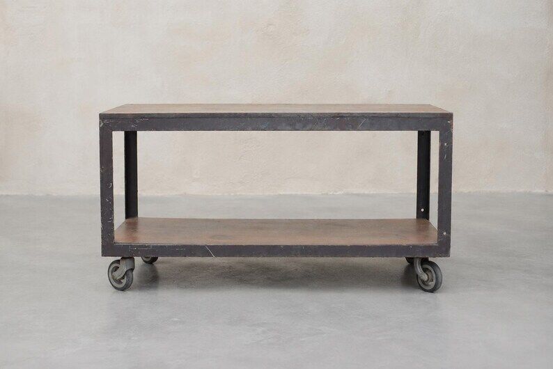Industrial coffee table in metal and wood, wheeled table, trolley, vintage table, interior decoration.