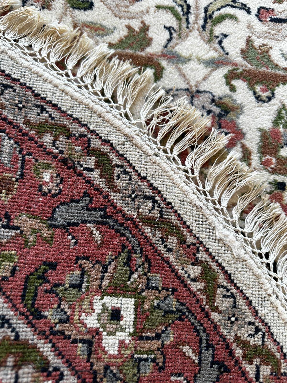 Handmade oval Persian rug 185cm x 120cm