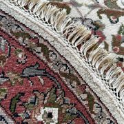 Handmade oval Persian rug 185cm x 120cm