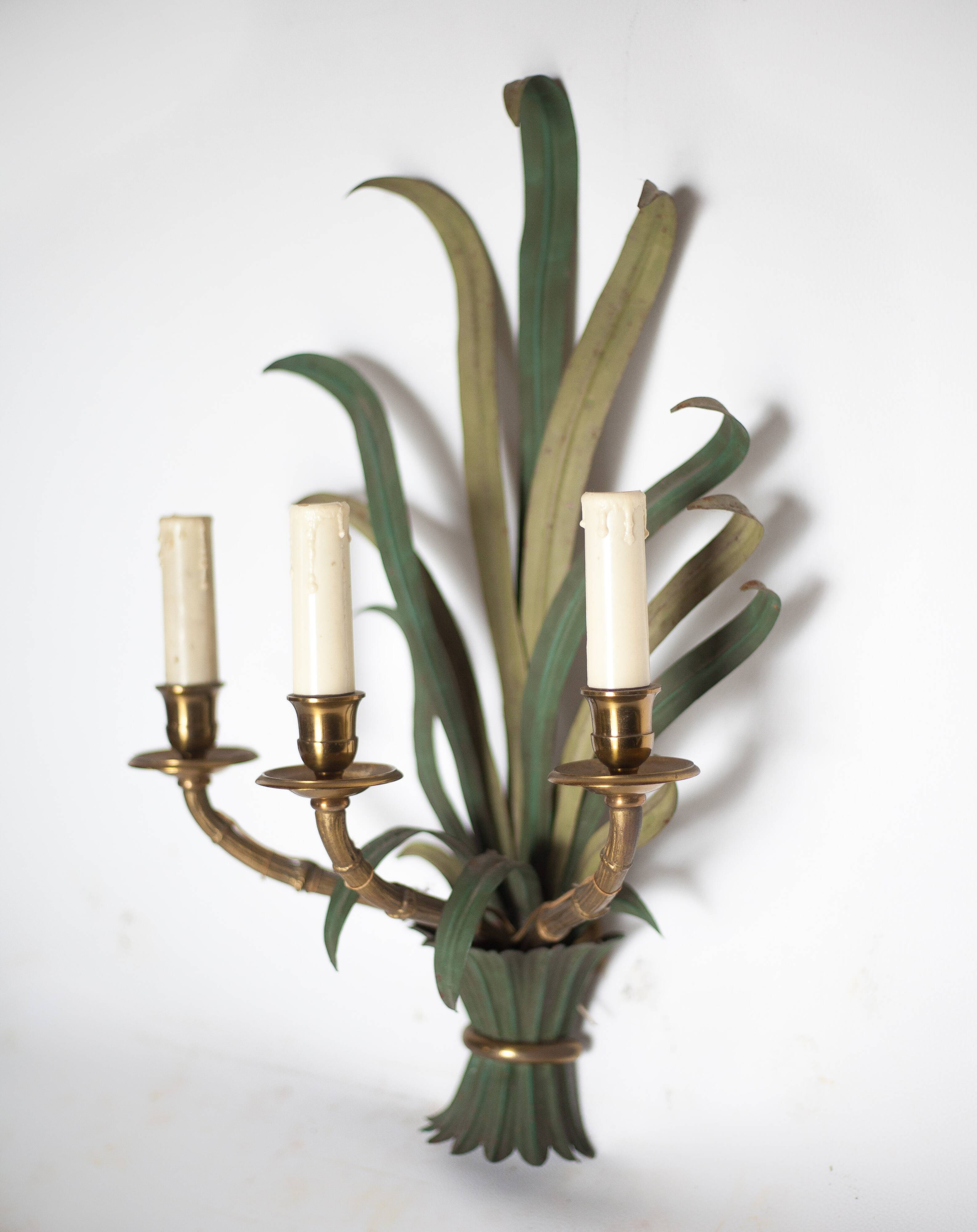 Pair of Maison Baguès wall lights with faux bamboo bronze and metal arms.