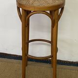 High stool in curved wood and cane seat