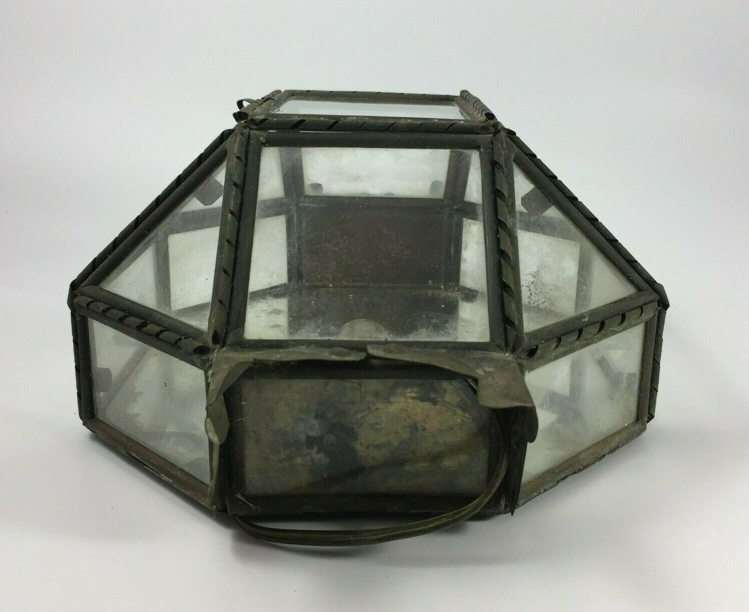 Metal and brass wall light with mirror background 1900