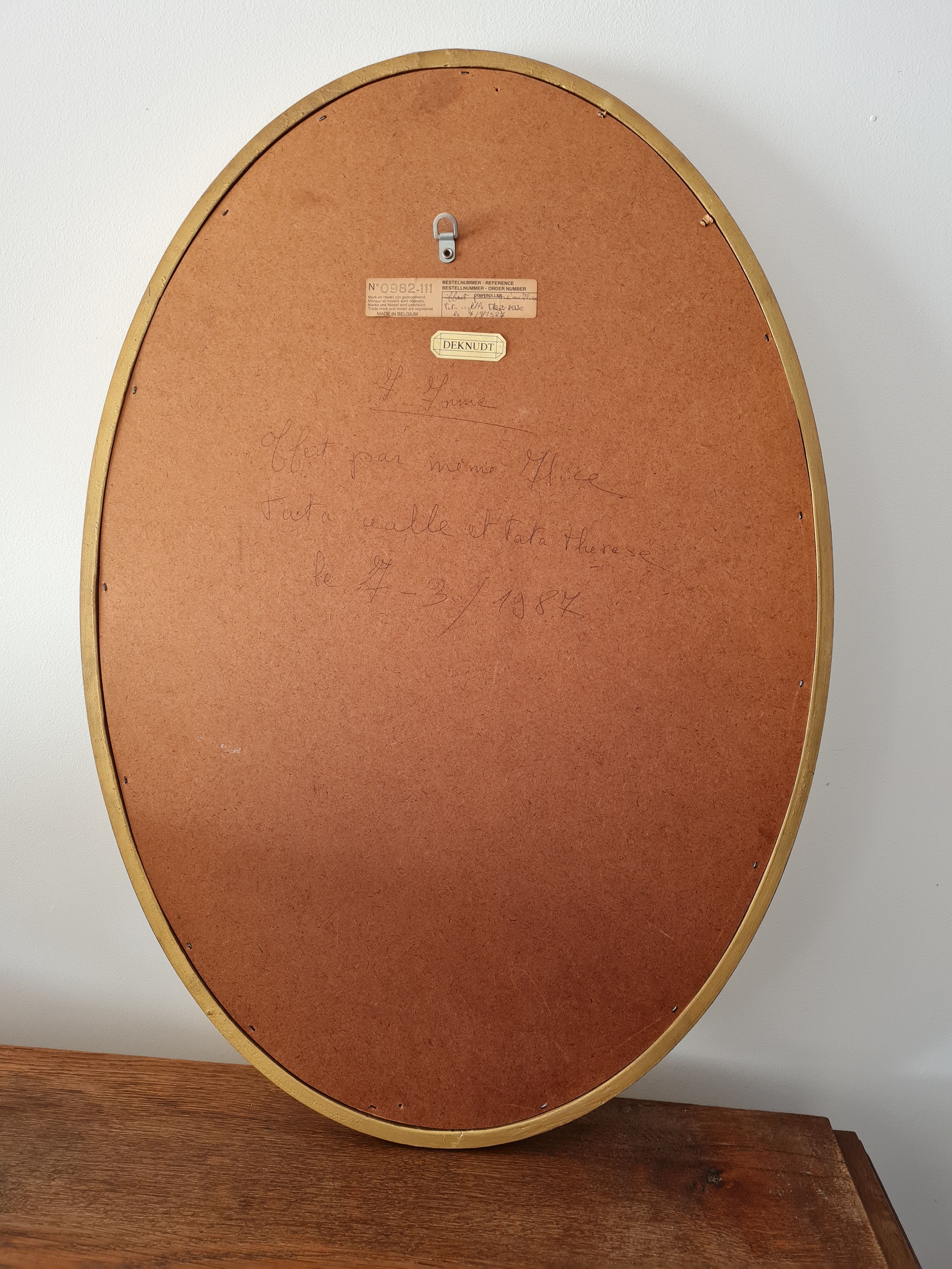 Large oval mirror gilded wood with red plate 44x66cm